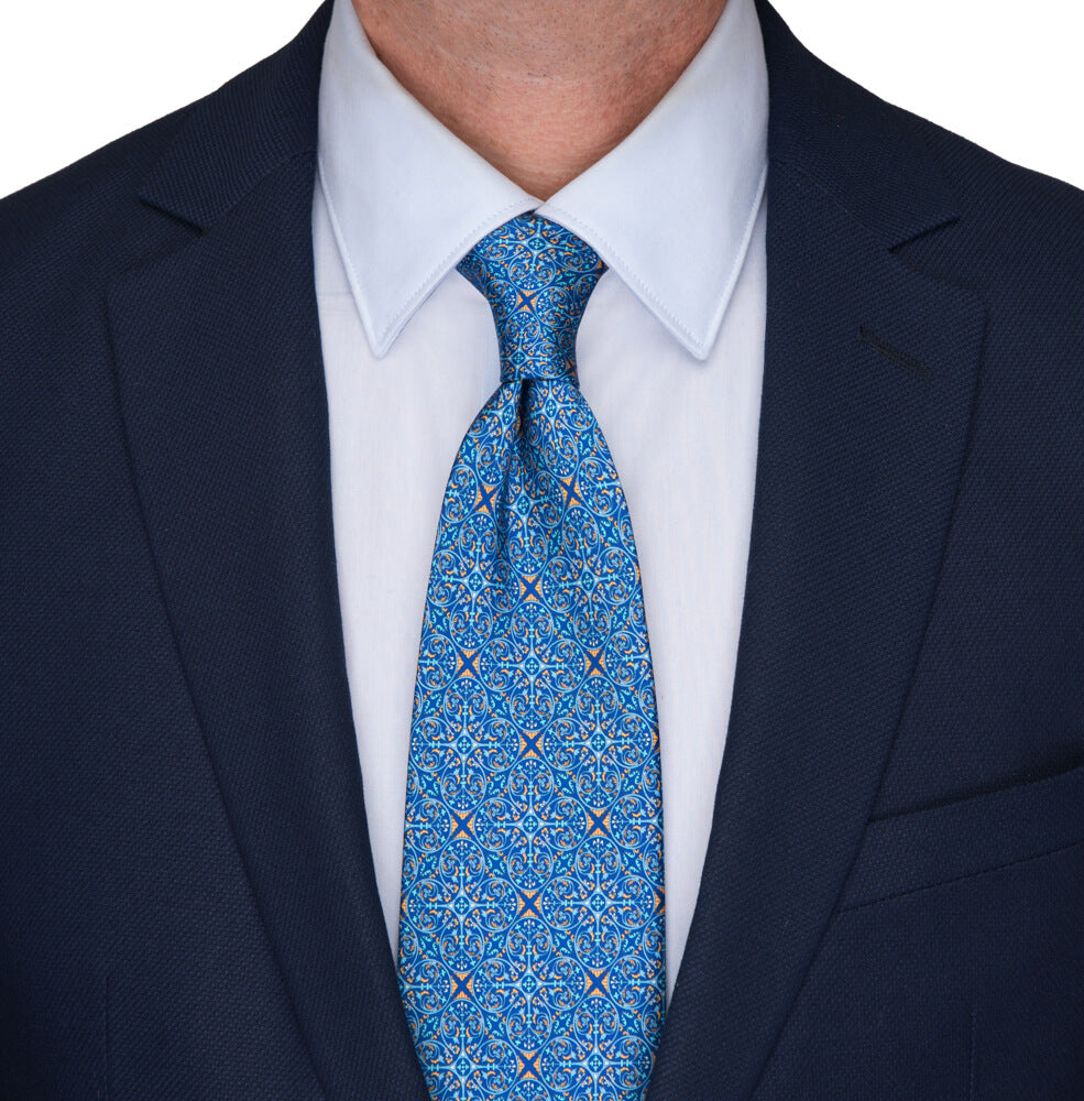 Cravatta sfoderata in lana e seta, tartan blu e azzurra